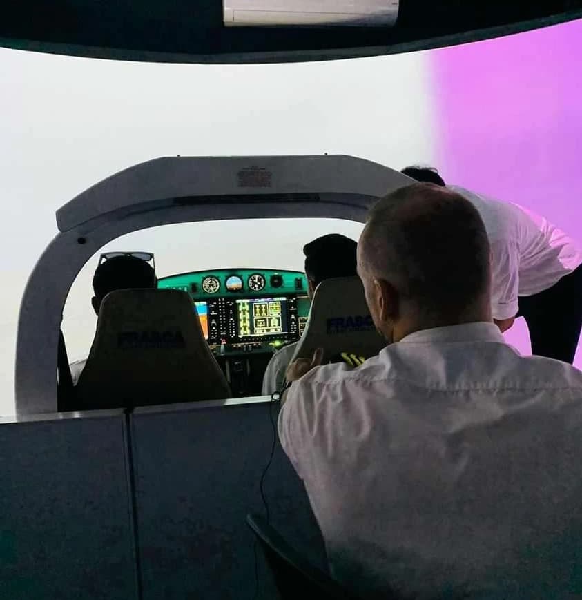 A behind-the-scenes view of the simulator filming setup.